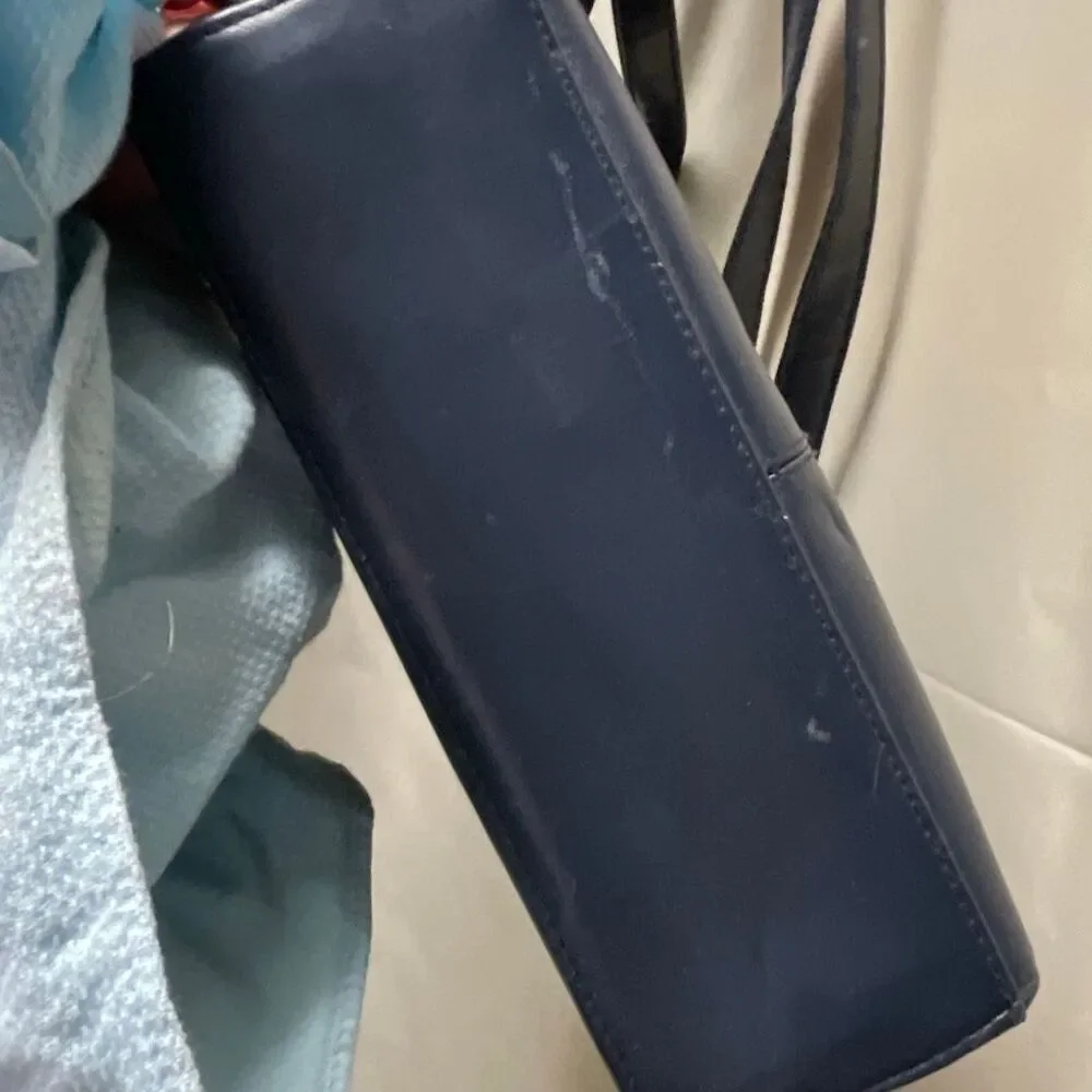 Vintage Colette blue leather shoulder bag.